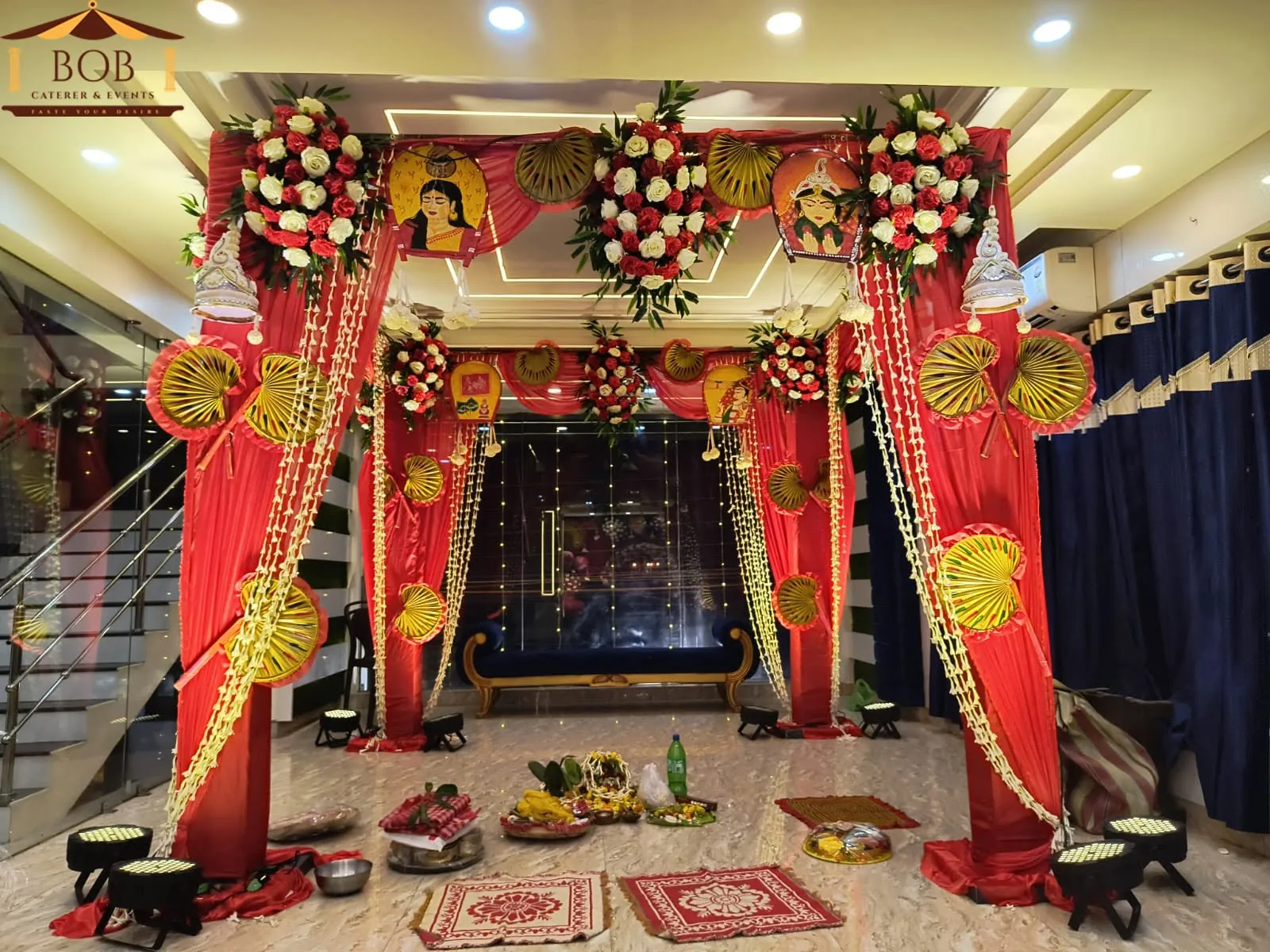 Traditional Bengali Wedding Mandap with Red Silk Drapes & Floral Garlands